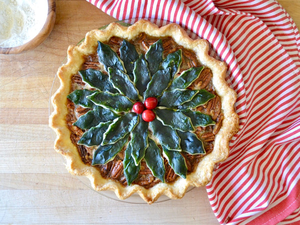 Pecan Pie with Holly Decorations
