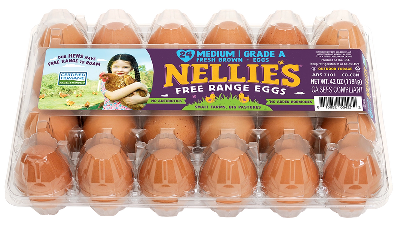 Carton of Nellie's free-range eggs with a label featuring a girl holding a chicken.