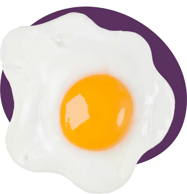 A fried egg with dark yellow yolks.